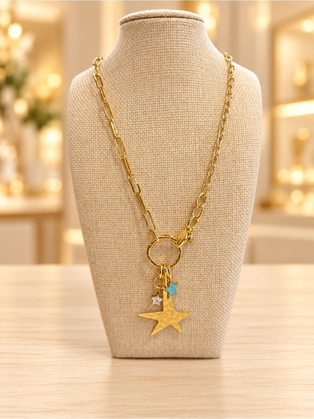 CHARMED HAMMERED STAR NECKLACE